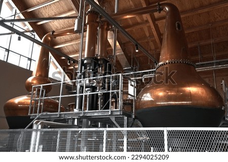 Distiller at a whiskey distillery in Hokkaido