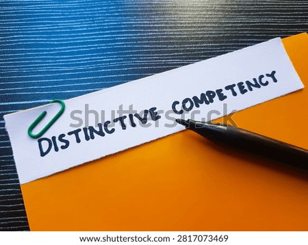 Distinctive competency writting on table background. 
