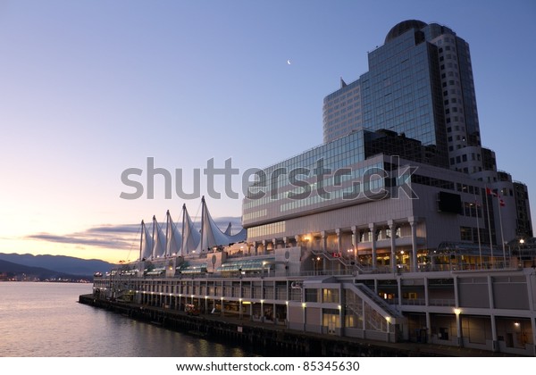 The distinctive sails of Canada Place,\
Vancouver\'s Trade and Convention Center as well as it\'s cruise ship\
terminal at dawn. British Columbia,\
Canada.