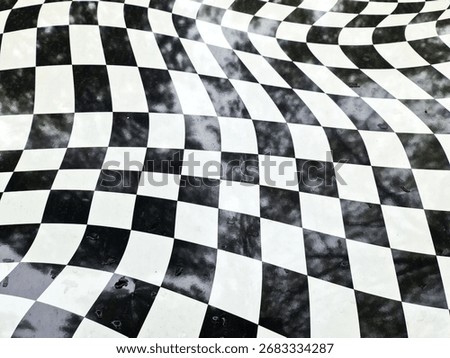 Distorted checkered pattern with a wavy, warped surface creating an abstract black and white optical illusion