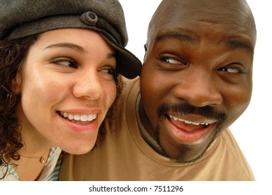 Distorted, fun portrait of two casual young people looking at each other and laughing; isolated on white