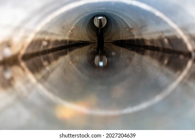 Distorted Water Surface Level View From Inside A Concrete Culvert