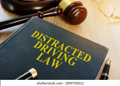 Distracted Driving Law And Gavel On A Desk.