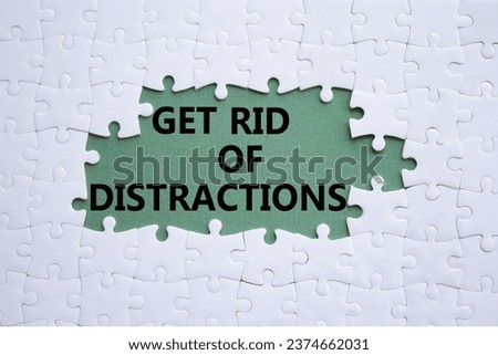 Distractions symbol. Concept word Get rid of Distractions on white puzzle. Beautiful grey green background. Business and Get rid of Distractions concept. Copy space