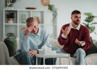Distraught partner crying while man talks in the background, facing difficulties and communication issues