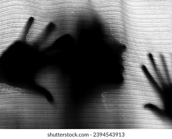 Distraught woman behind the curtain 2 - Shutterstock ID 2394543913