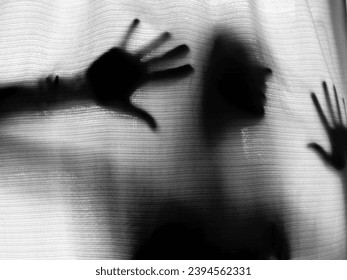 Distraught woman behind the curtain 3 - Shutterstock ID 2394562331