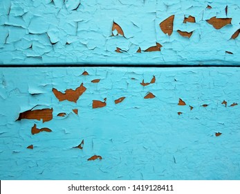 Distressed building wall with aged paint chipping off. Textured wainscoting wall paneling with chipped and cracked paint chips falling off. Antique old aged painted finish. - Shutterstock ID 1419128411