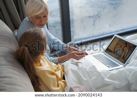 Similar – Female doctor showing an x-ray on the tablet