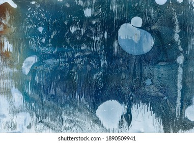 Distressed Overlay. Weathered Screen. Blue Stained Surface With Abstract Frost Marks. Grunge Aged Glass Background With Grainy Noise.