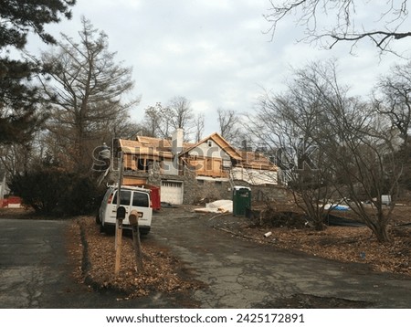 Distressed Property with Van in front