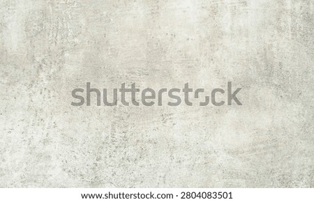 Distressed textures define this neutral grey concrete stone surface with aged plaster