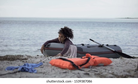 Distressed Woman Lying In Boat Waiting Help, Survived Storm, Natural Disaster