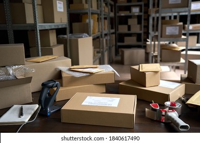 Distribution warehouse background, commercial shipping order boxes for dispatching on stockroom table, post courier delivery package, dropshipping commerce retail store shipment storage concept. - Shutterstock ID 1840617490