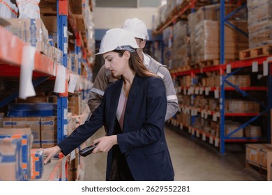 Distribution warehouse manager and client businesswoman using digital tablet checking inventory storage on shelf. Storehouse business worker and logistic engineer standing together at storage service