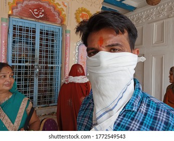 District Katni, Madhya Pradesh, India - July 08, 2020: An Indian City Male Wearing Face Mask At Hindu Temple During Worship For Corona Virus Protection. 