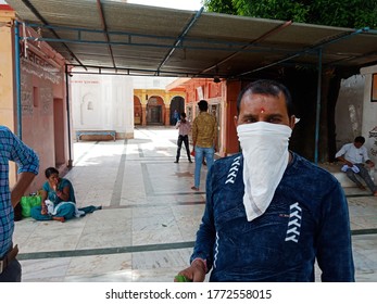 District Katni, Madhya Pradesh, India - July 08, 2020: An Indian Man Wearing Face Mask At Hindu Religious Place For Corona Virus Protection. 