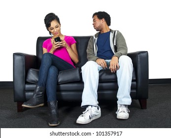 Distrusting Couple Snooping On Cell Phone Text Messages