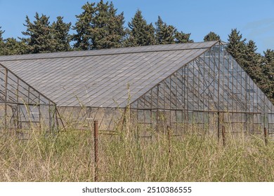 disused, abandoned, old glass agricultural greenhouse, - Powered by Shutterstock