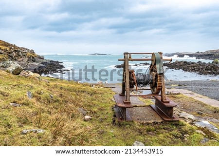 Disused Boat winch above the slipway at Mealastra on the west coast of the Isle of Lewis in the outer Hebrides, Scotland