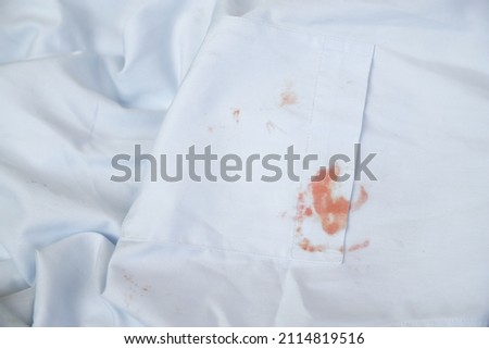 dity cosmetic stain on cloth from using in daily life for cleaning concept