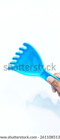 Dive into clean with this trusty blue helper on white background
