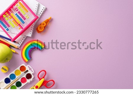 Dive into the joy of learning with this top view composition: a delightful display of abacus, paints, colorful child stationery set against violet background, providing copyspace for text or adverts