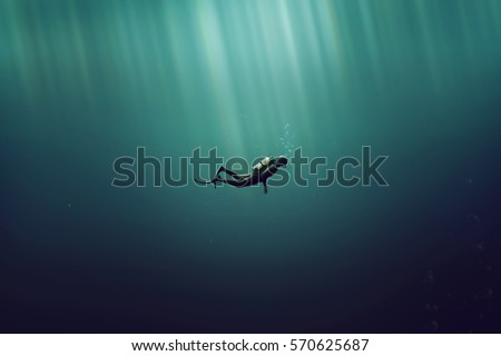 Diver in the deep sea