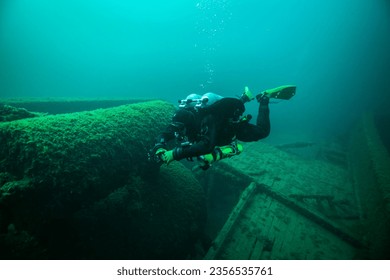 Diver exploring the shipwreck, Dolphin in the Straits of Mackinac.