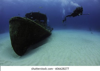 Diver With The Papa Doc Wreck After The Hurricane