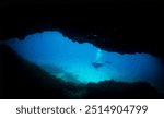 a diver in an underwater cave in the caribbean sea                               