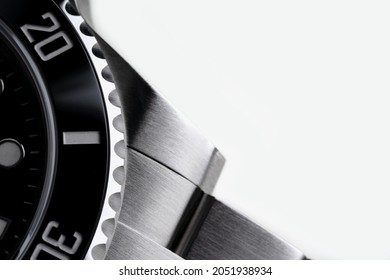 Diver Watch close up detail against white background with copy space.