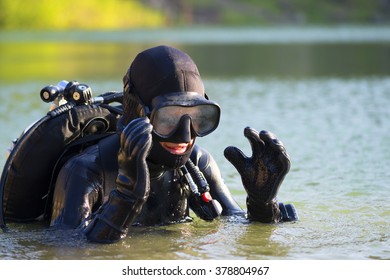 diver woman in the water - Powered by Shutterstock