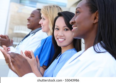 A Diverse Attractive Man And Woman Medical Team At Hospital Building