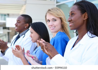 A Diverse Attractive Man And Woman Medical Team At Hospital Building