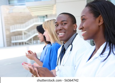 A Diverse Attractive Man And Woman Medical Team At Hospital Building