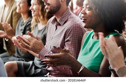 Diverse Audiences Giving An Applause