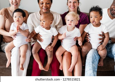 Diverse Babies With Their Parents