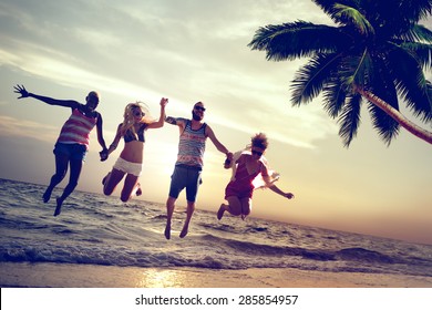 Diverse Beach Summer Friends Fun Jump Shot Concept