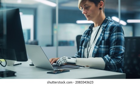 Diverse Body Positive Office: Portrait Of Motivated Woman With Disability Using Prosthetic Arm To Work On Computer. Professional With Futuristic Thought Powered Myoelectric Bionic Hand