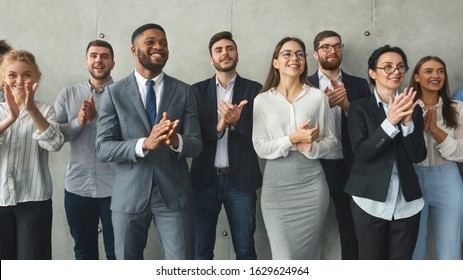 Diverse Business Colleagues Clapping Hands After Successful Group Meeting, Panorama