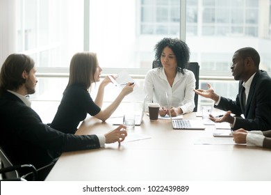 Diverse business partners arguing about bad contract at meeting in lawyers office, disgruntled clients disputing about scam fraud in law firm, cheated investors having claims dissatisfied with loan - Shutterstock ID 1022439889