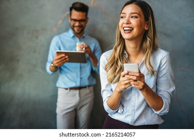 Diverse Business People Colleagues Laughing Having Fun With Digital Gadgets In Office.