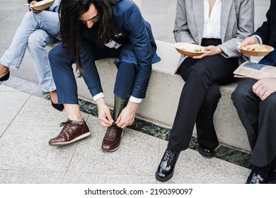 Diverse Business People Doing Lunch Break Outdoor From Office Building - Focus On Man With Prosthetic Leg