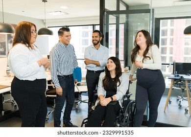 Diverse business people having casual discussing after meeting at startup office