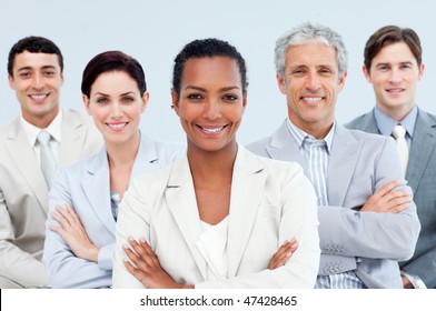 Diverse Business People Standing With Folded Arms Smiling At The Camera