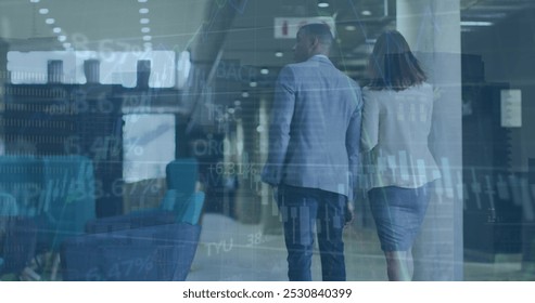 Diverse business people talking and walking in a modern officethe business people in this image are discussing the global economy and financial concepts in a modern office setting the image features a - Powered by Shutterstock