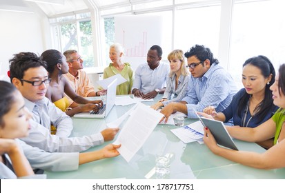 Diverse Business People Working Together in Office - Shutterstock ID 178717751