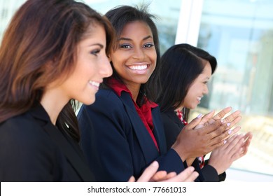 A Diverse Business Woman Team Clapping At Presentation