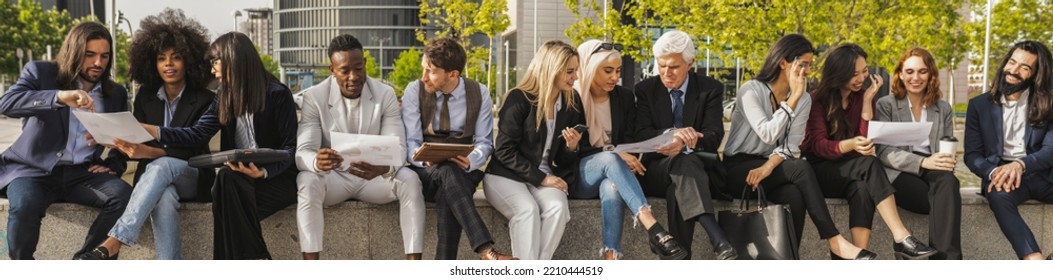 Diverse Businessmen And Businesswomen, Sitting Outside An Office Building Taking A Break Together, People Of Different Ages And Different Countries, Multiracial, Co-workers.